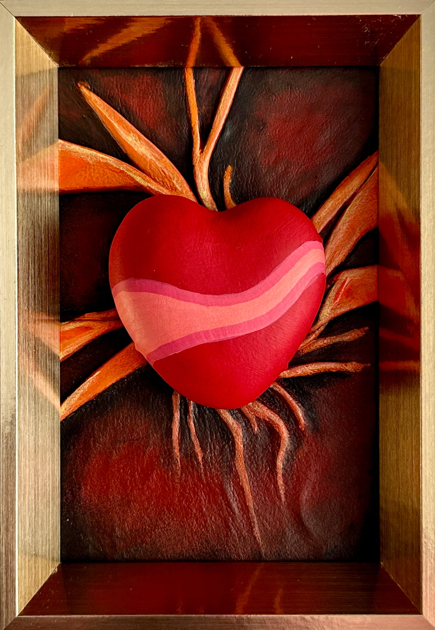Upcycled genuine leather heart art with acrylic paints, great for gifts.