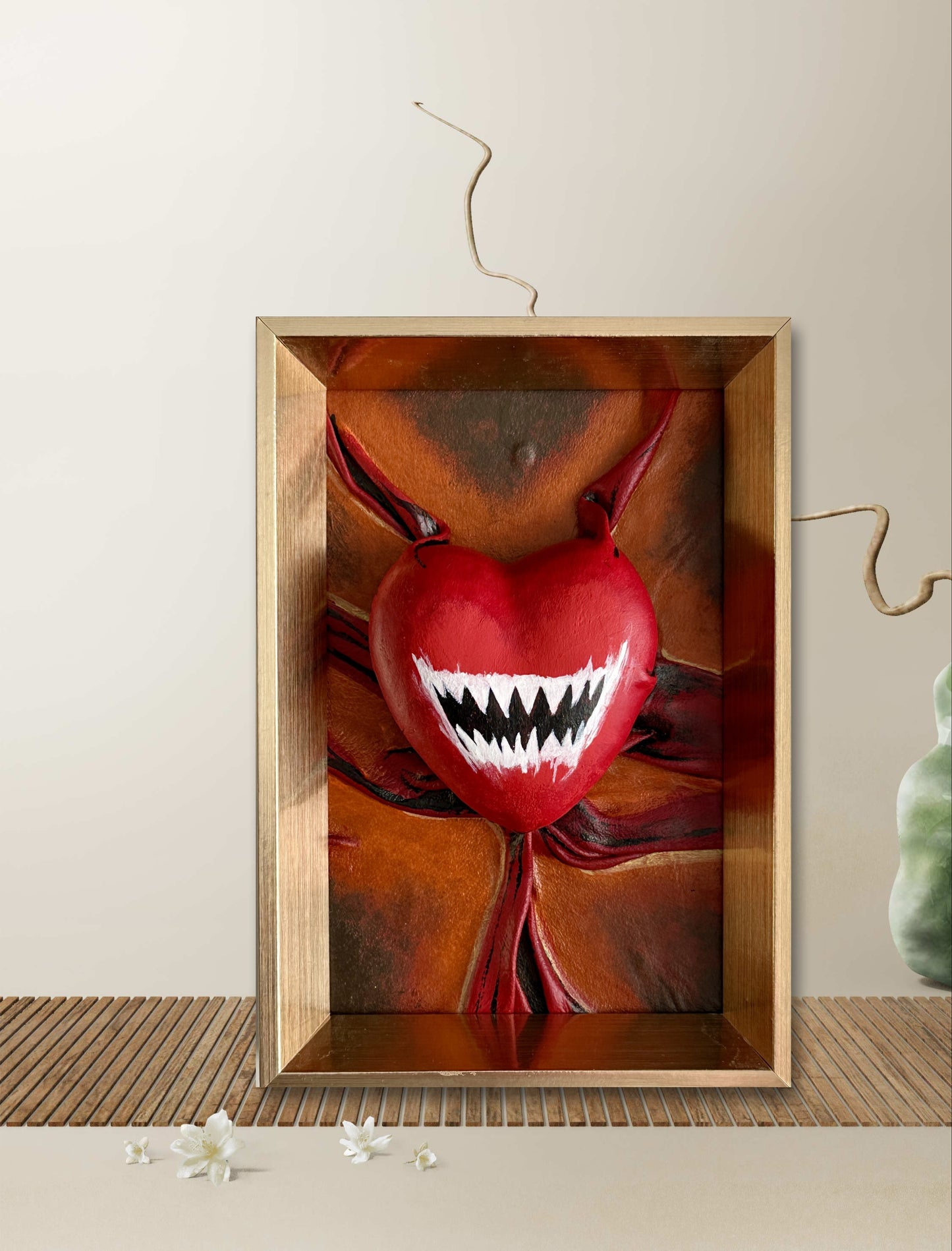 Fun and artistic leather heart sculpture with fangs, perfect for Valentine's Day or as a unique home decor piece.