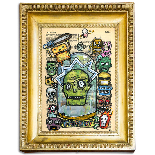 "Franky" artwork with a green head in a glass jar on a vintage dictionary page.