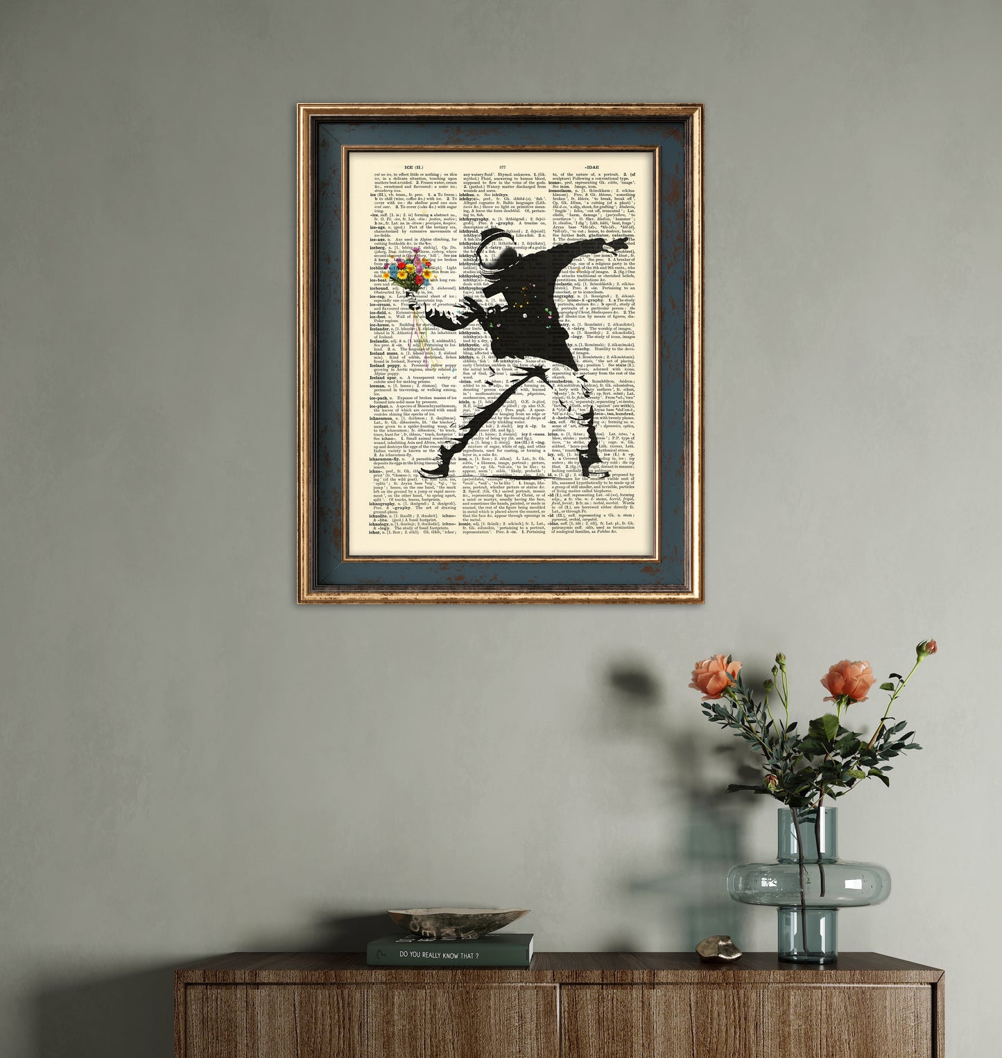 Limited edition artwork of an astronaut throwing flowers, drawn in a Banksy-inspired style on a vintage dictionary page.