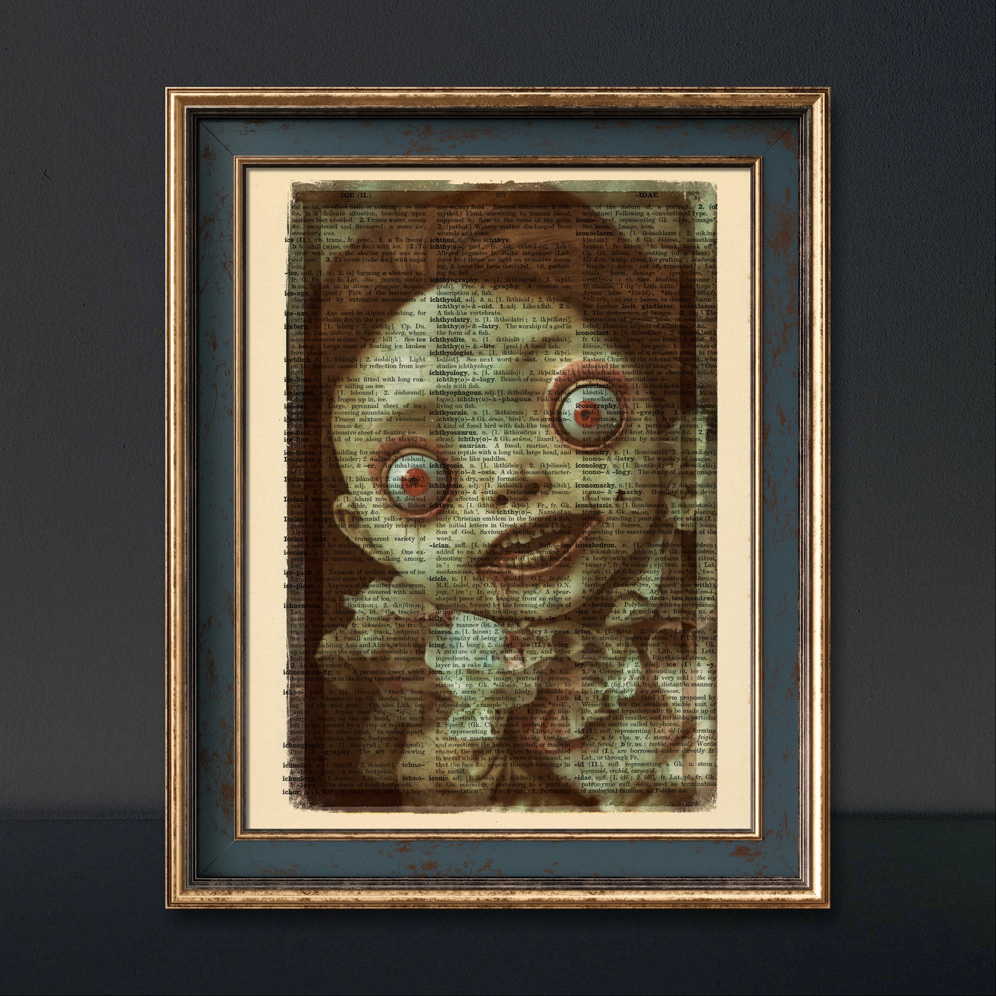 "The Horror Show - Creepy Doll" print on a vintage dictionary page, featuring a doll with a sinister smile and bloodshot eyes.