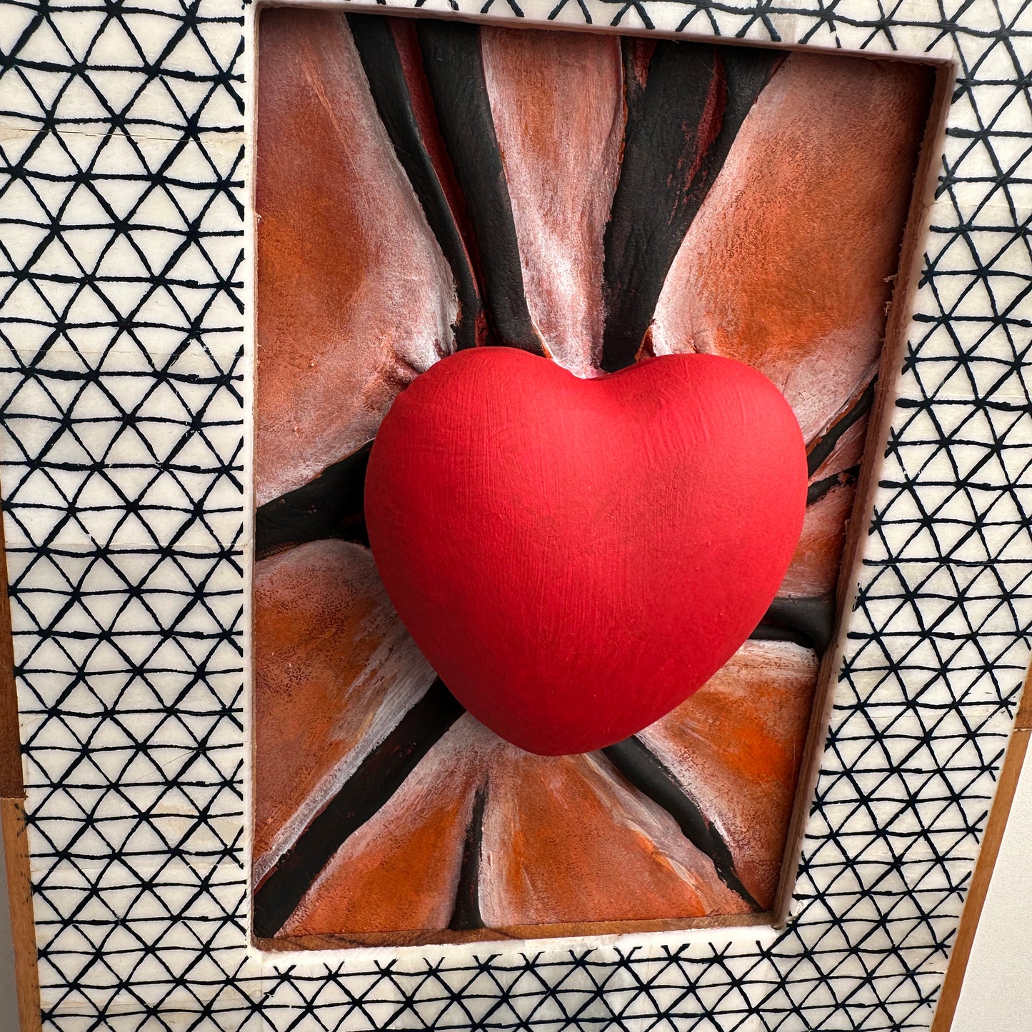 Hand-painted leather sculpture framed and ready to hang in your living room or office.
