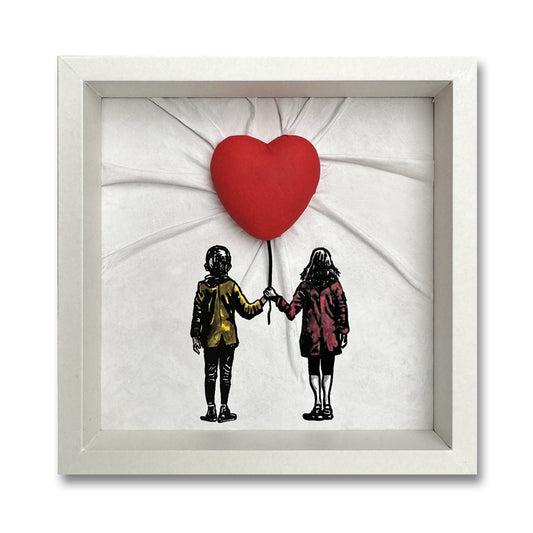 "Together - Girl and Boy with a Red Heart Balloon" Novasuede leather sculpture in a white silk frame, inspired by Banksy's classic mural art.