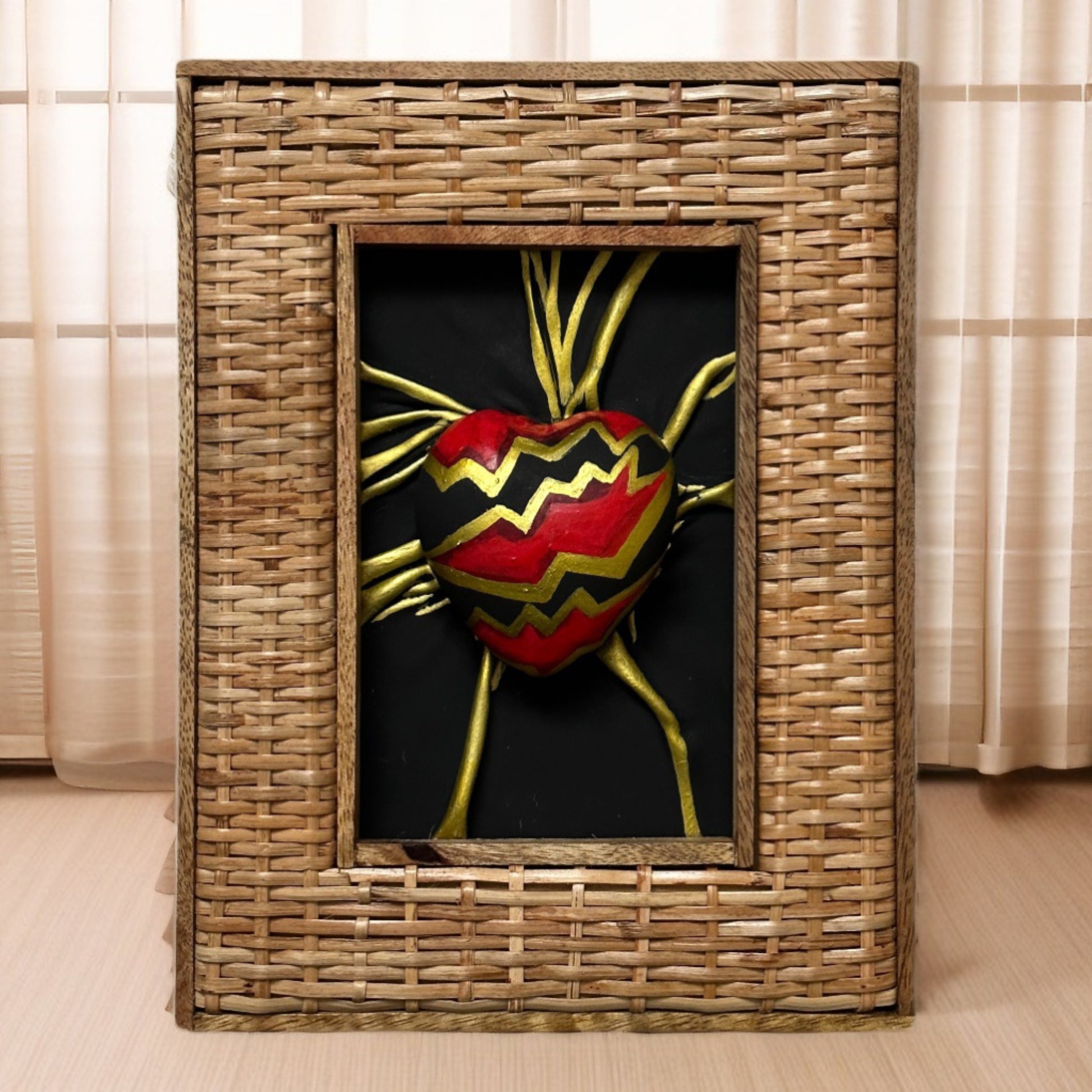 Unique leather heart artwork, hand-painted and sculpted, encased in a wooden frame with a touch of gold leaf, ready to enhance any space.