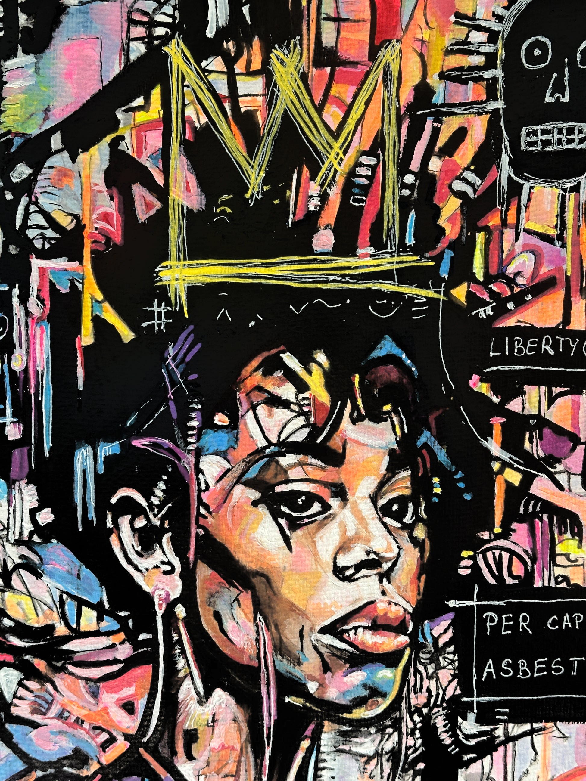 A vibrant, multicolored graffiti-style portrait painting of a Black man's face, featuring a yellow crown and urban street art elements like 'LIBERTY' and 'PER CAP ASBEST' on a black background.