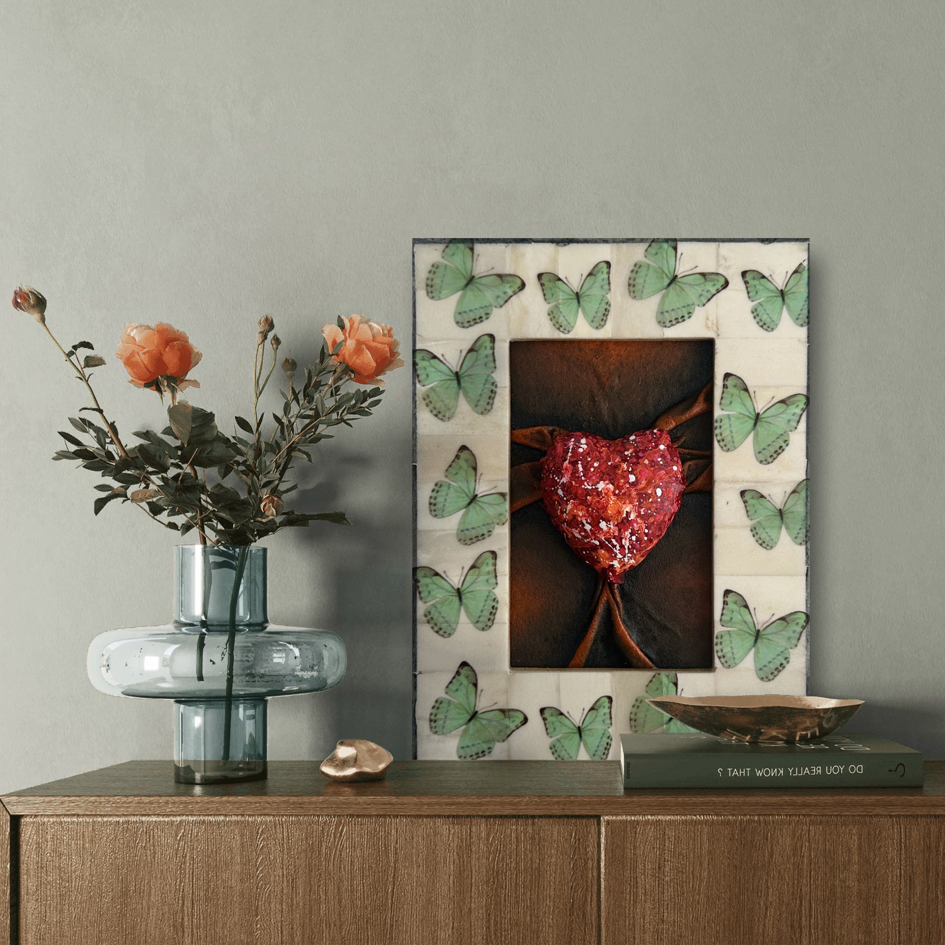 A modern, sustainable decor choice, Lovers Heart Butterfly Dreams reimagines discarded leather into a striking heart-shaped sculpture.