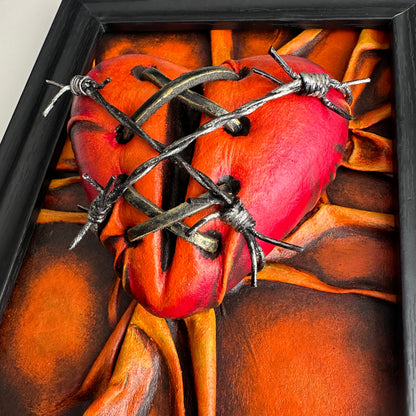 Heart-shaped vegan leather sculpture with black shadow details, embodying a fusion of material and emotion in vibrant colors.