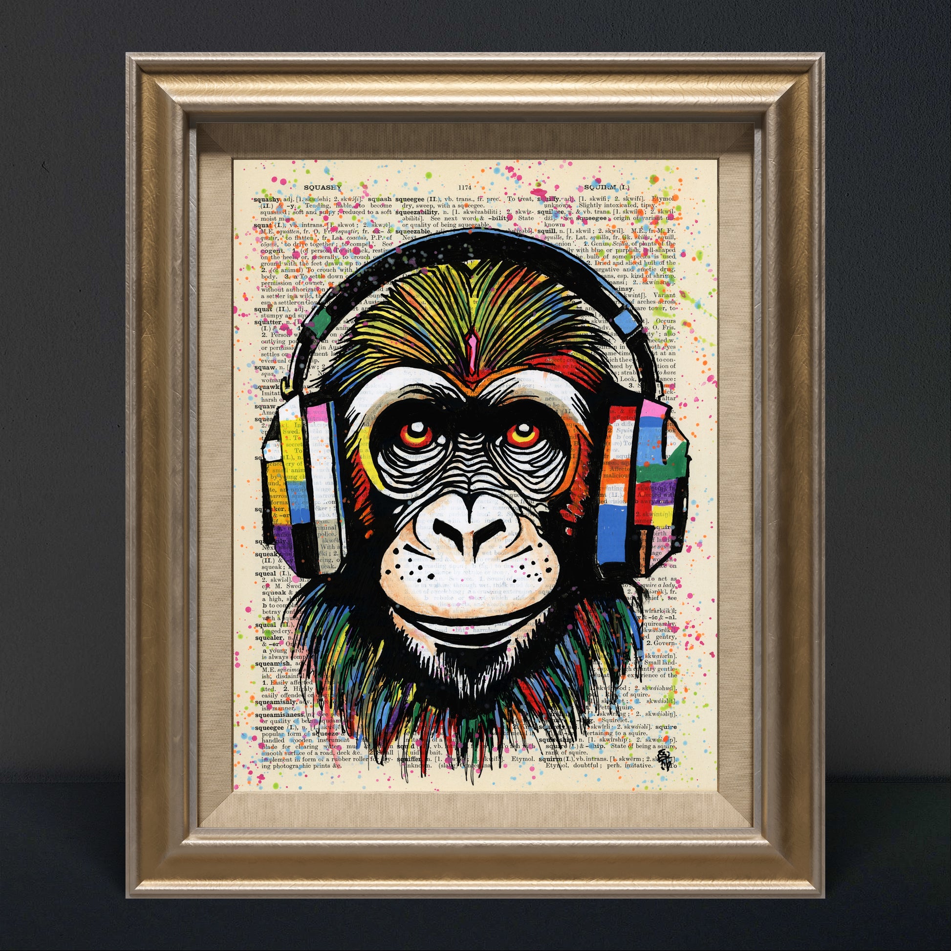 Bright, colorful chimpanzee with large headphones in "Monkey Business" artwork on a reclaimed dictionary page.