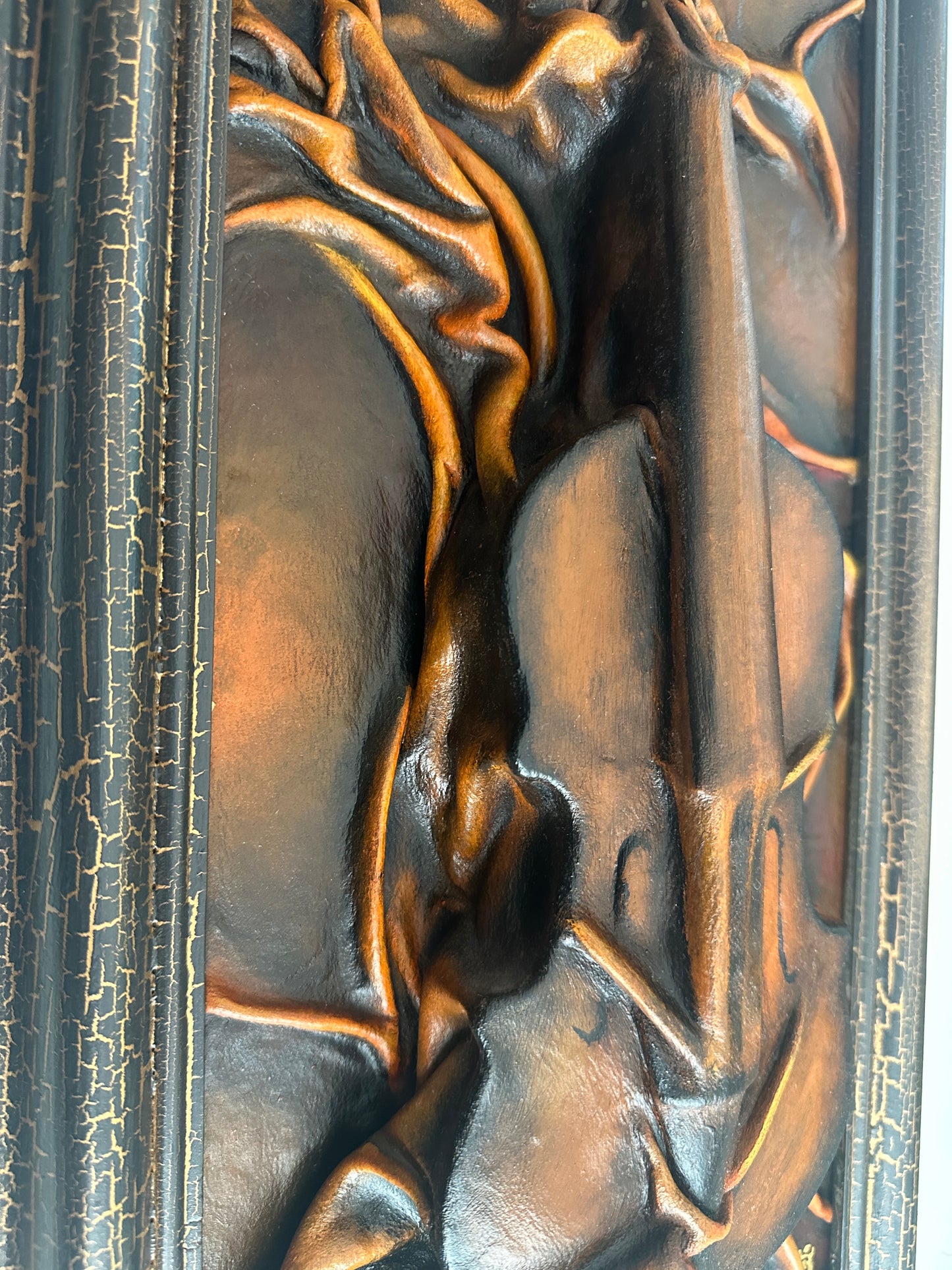 Dark contemporary leather relief sculpture