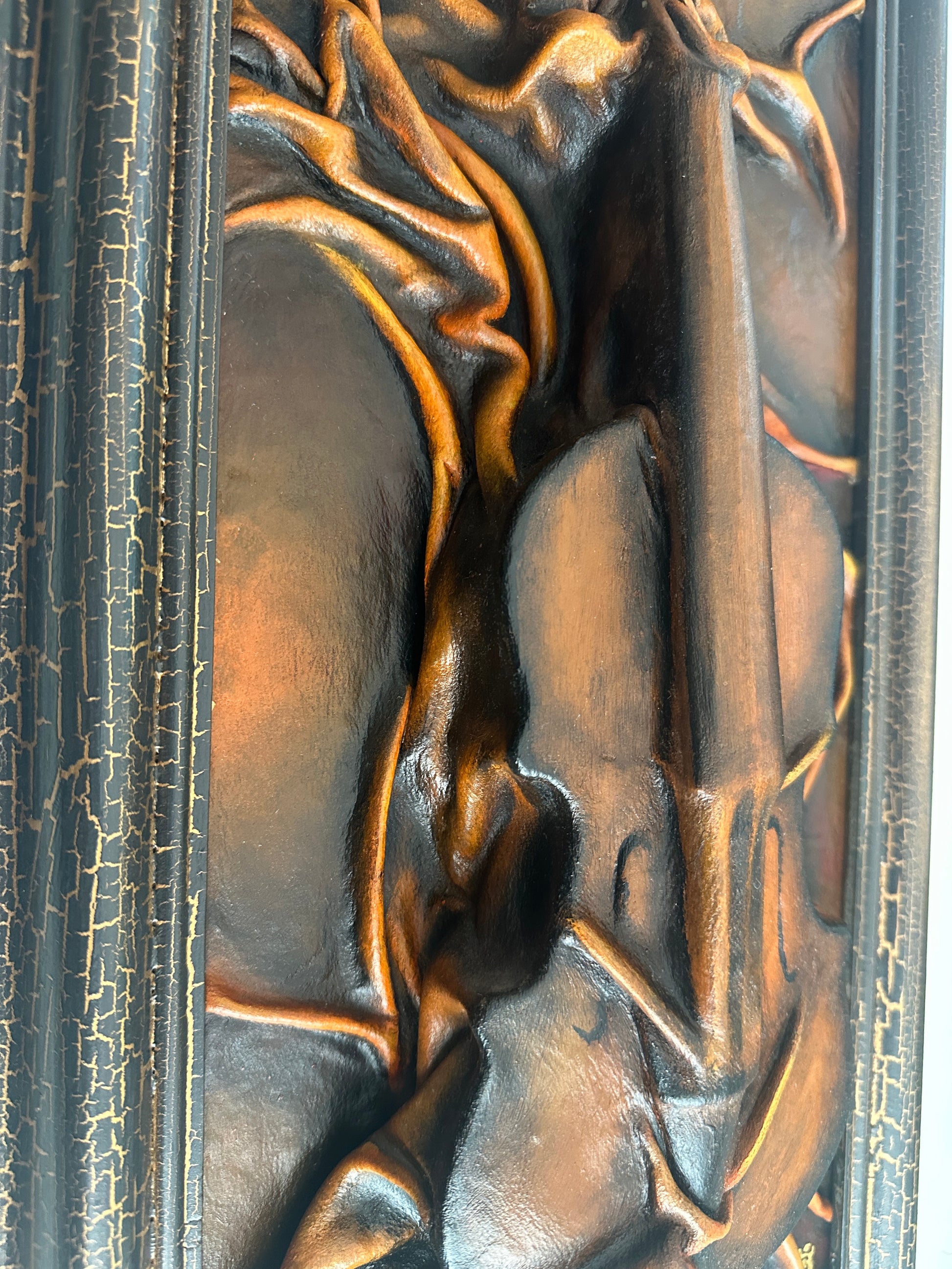 Dark contemporary leather relief sculpture