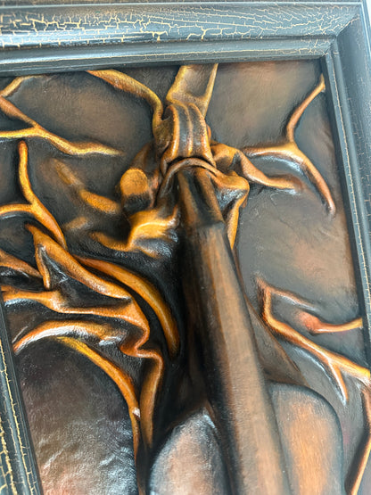 Leather sculpture with musical violin motif