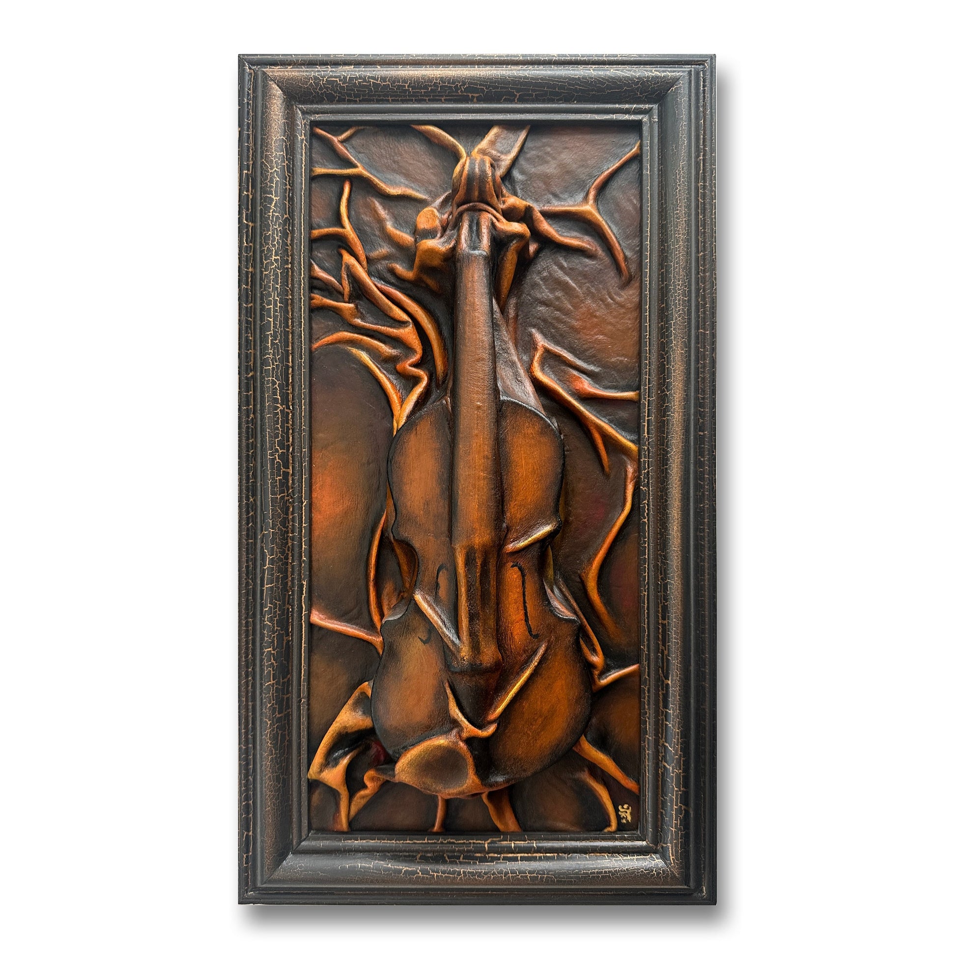 Decorative wall art with a violin design in a bronze frame on a white background