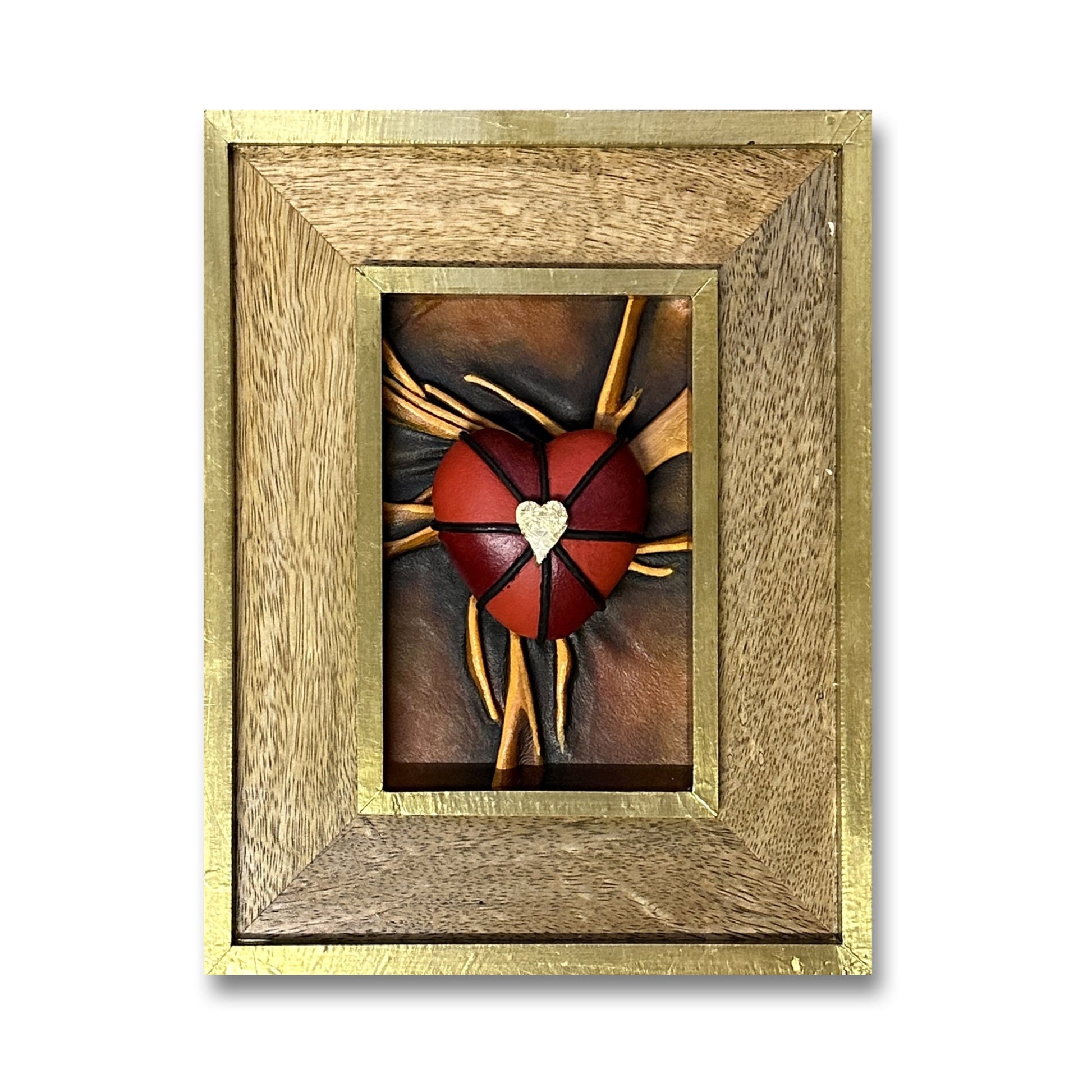 Hand-sculpted leather heart sculpture with black, red, and gold accents, encased in a gold leaf-finished wooden frame.