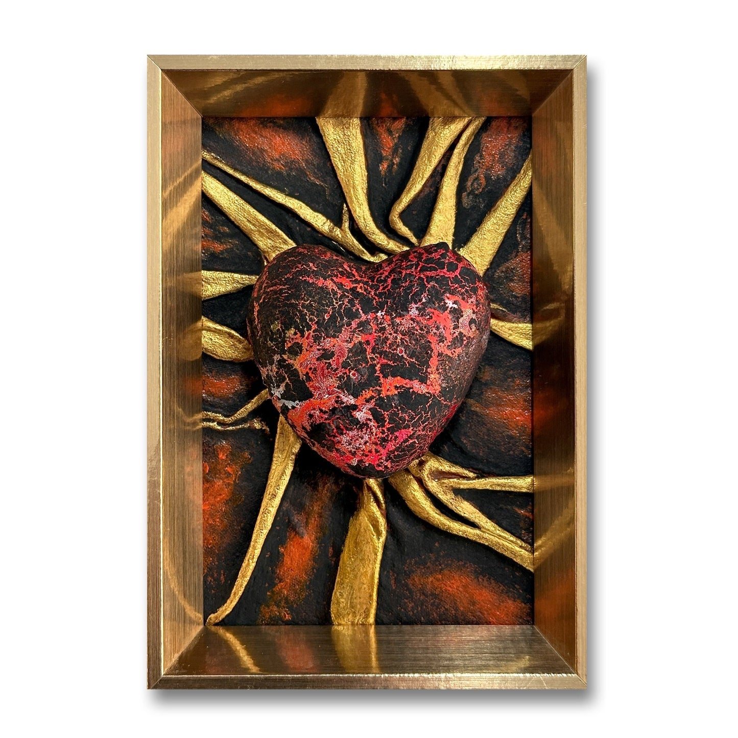 Introducing the captivating leather sculpture Lovers Heart - Lava Flow, a unique piece in red, black, and gold.
