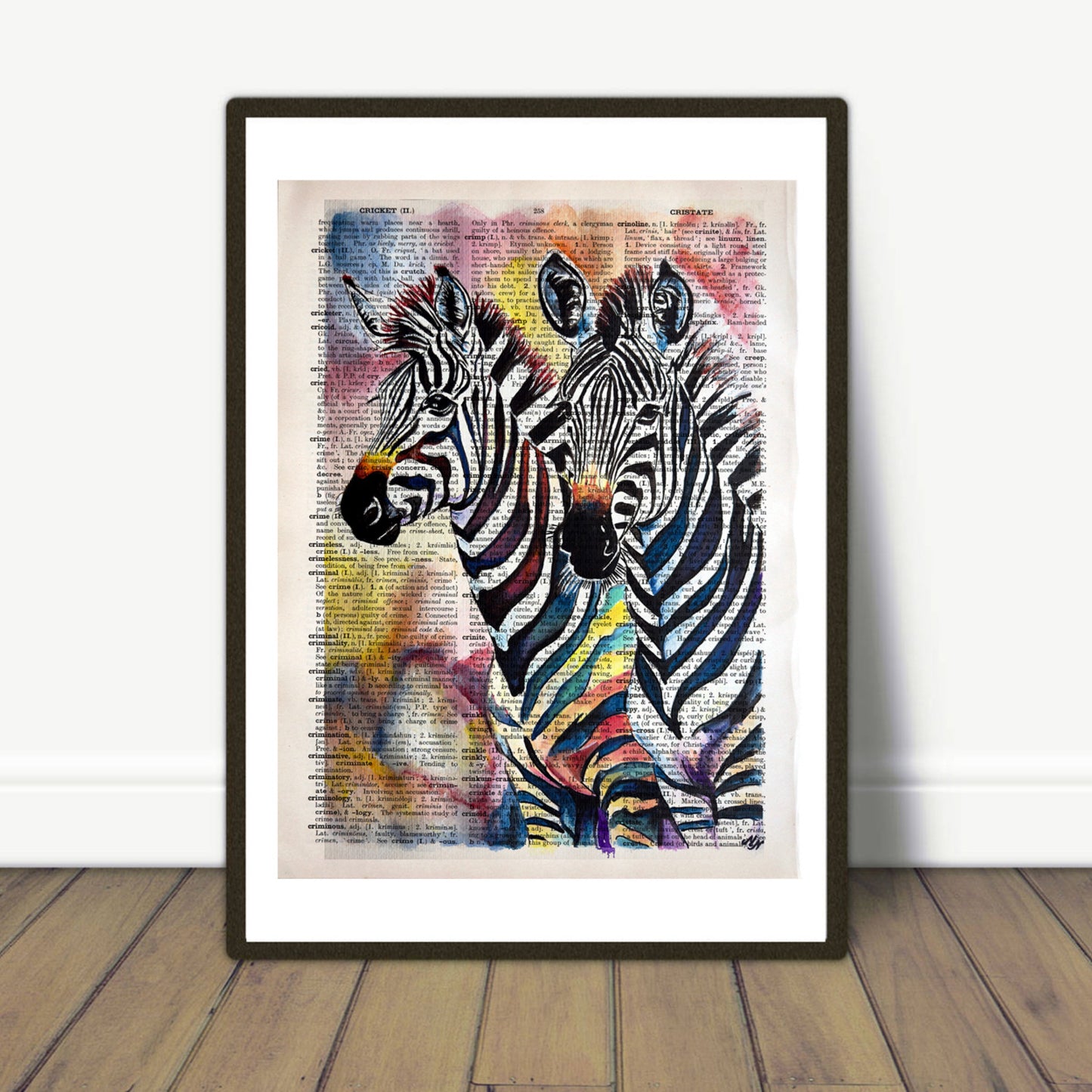Misty Lady's "Joyful Zebras" digital art on an upcycled 1930s English dictionary page, blending whimsy and vintage charm.