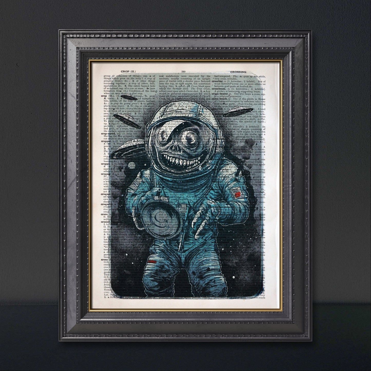 The "Cosmic Plague" artwork showcases a terrifying creature with flying saucers, crafted on an upcycled dictionary page.