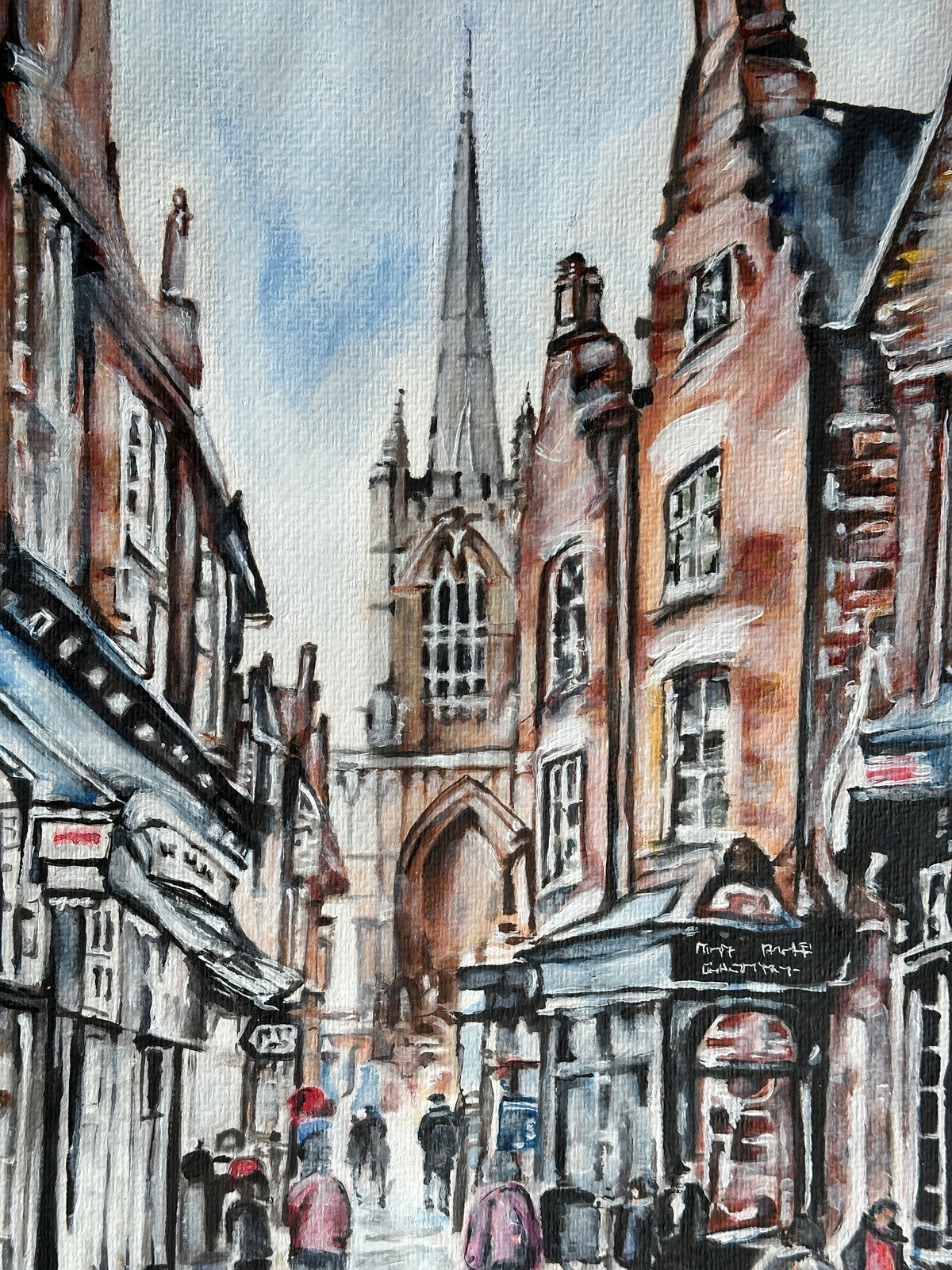 Original Lincoln cityscape painting with warm brick buildings and cool blue tones